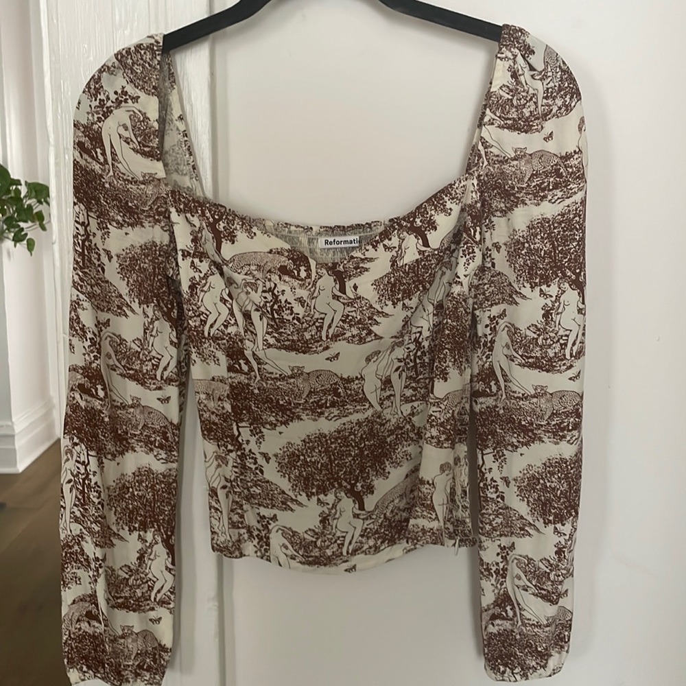 Cute reformation top. Only worn once.